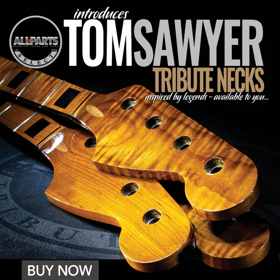 guitar necks with the words tom sawyer across it